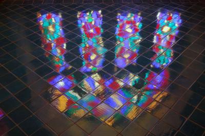 Reflection of the stained glass window in the floor of the winter prayer hall
