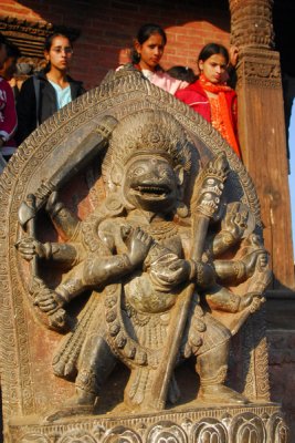 Goddesses Baghini and Singhini atop the steps of Nyatapola Temple