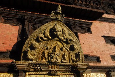 Golden torana with Shiva, Parvati, Ganesh and Kumar, Golden Gate, Royal Palace, Durbar Square, Patan