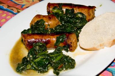 hot sausages and garlic spinach