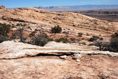 Rock bridge supporting a bamboo hiking stick (stick is 6 feet [1.8m] long)