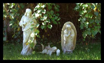 Virgin and Cristo in the back yard.