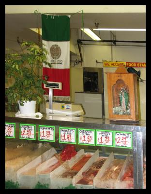 Virgin at the meat counter at El Mercado ELA.
