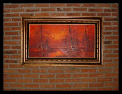 Red painting on a red brick wall
