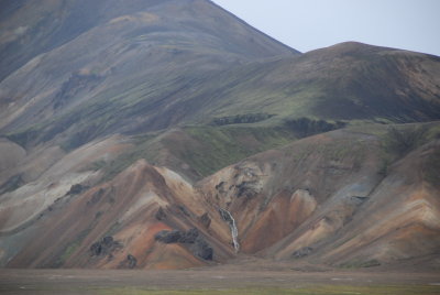 The multicolored hills are made of rhyolite