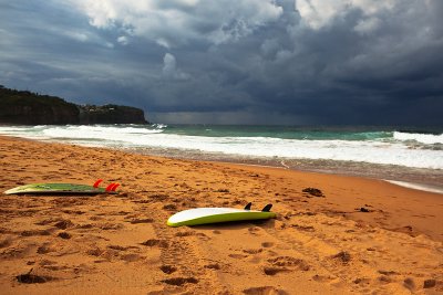 Surfboards and approaching storm