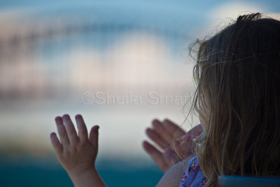 Child with Sydney Harbour Bridge backdrop