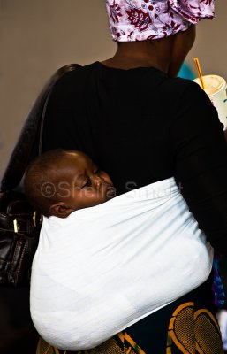 African lady with baby on back