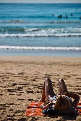 Sunbaking on Manly Beach
