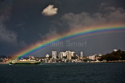 Manly ferry with rainbow on Sydney Harbour