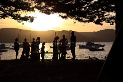 Silhouette of family at barbecue at Pittwater