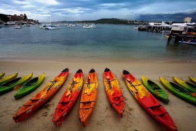 Kayaks and approaching storm at Manly