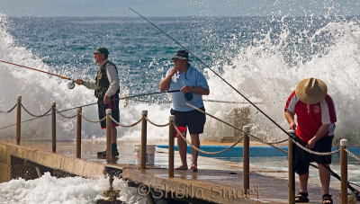 Three fishermen oblivious!