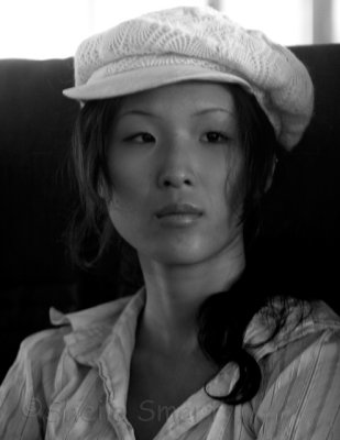 Asian girl on ferry in mono
