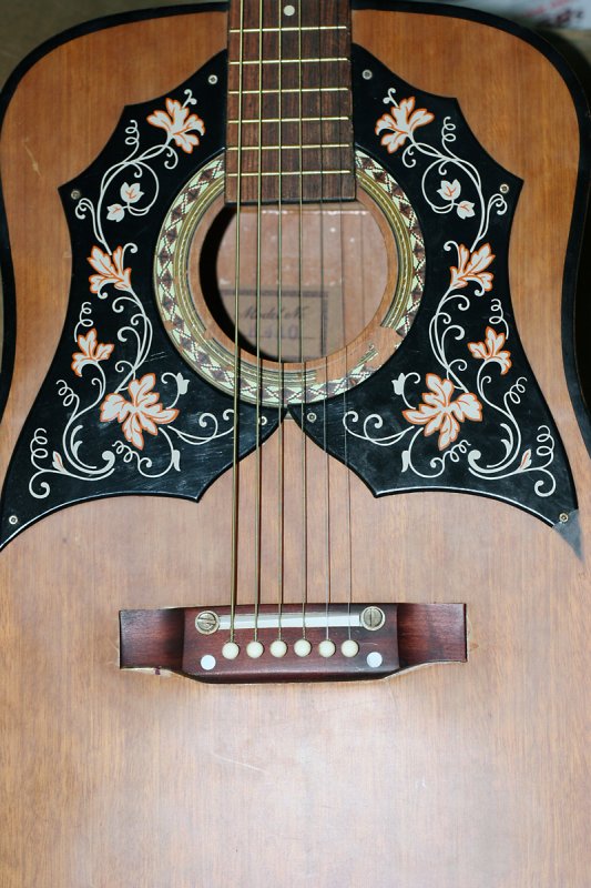 Vintage Kay acoustic front showing sound hole  bridge.jpg