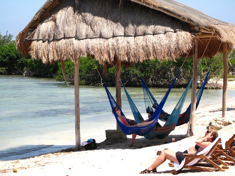 Snoozing in the hammocks after a long day snorkling