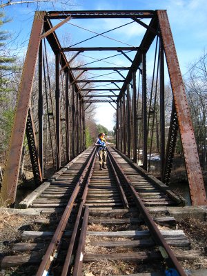 Julie on an abandoned rail road bridge