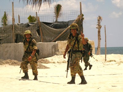 Mexican soldiers patrolling the beach