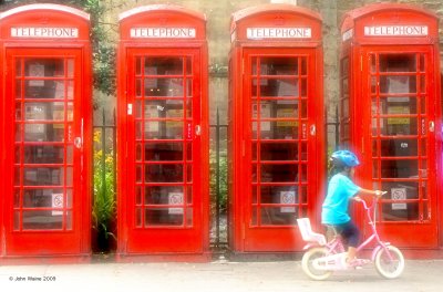 Cyclist and Phone Boxes