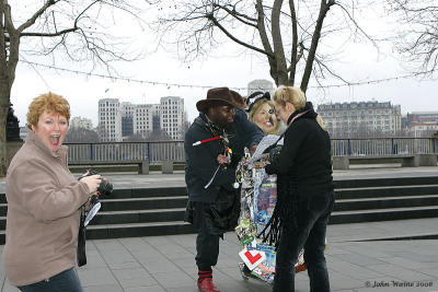 Bev Harrison and Carol with War victim and his campaign material!