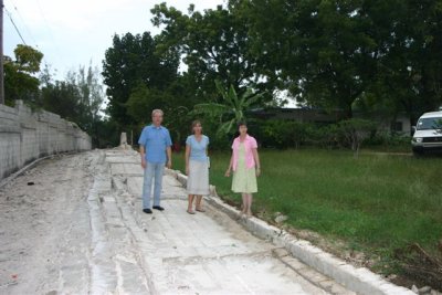 Dr Warrick, Rachel, Martha standing where the wall is now on the road