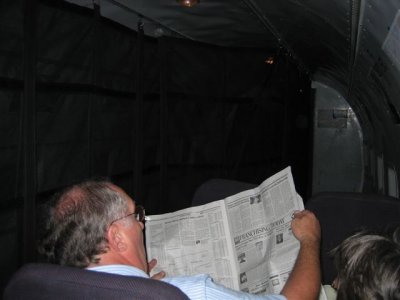 on the plane, 1st newspaper he had seen in a week, who cares if it is old