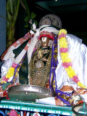 Sri Peyazhwar after receiving Malai and Parivatta mariyadai from Sri Parthsarathi at mylapore.JPG