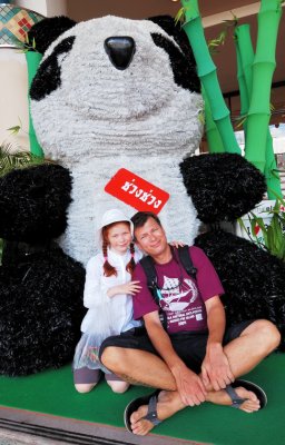 With a giant panda in Chiang Mai, Thailand