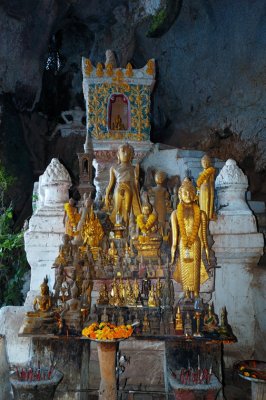Some of the 10,000 Buddha images inside the Tham Ting caves