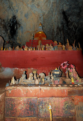 Some of the 10,000 Buddha images inside the Tham Ting caves