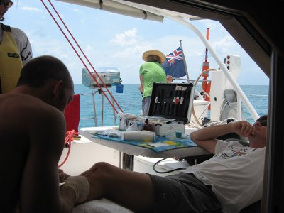 Drew stitching Seva's leg, Blue Hole, Lighthouse Atoll,Belize