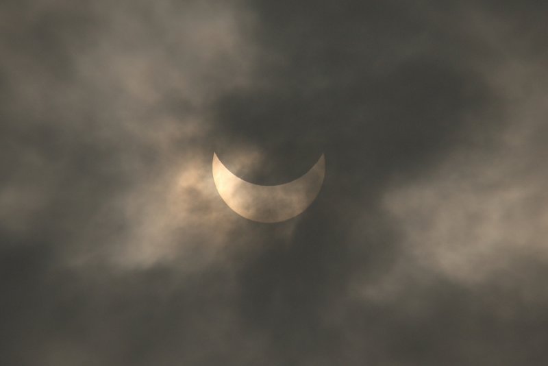 2009 Eclipse  - Partial phase of the eclipse, seen through cloud