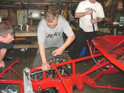 Tony Formosa Jr adjusting chassis