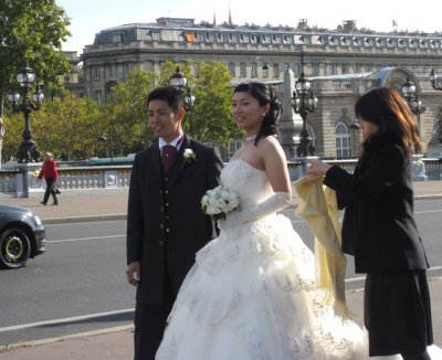 Adjusting the dress for the photograph