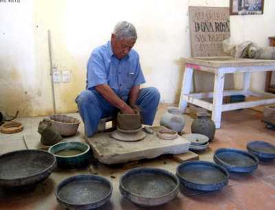 Valente Nieto, son of Dona Rosa, demonstrates pottery without a wheel
