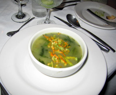 Soup with zucchini flowers