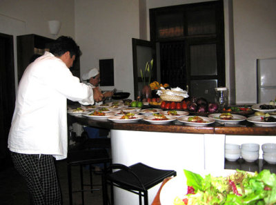 Chef giving finishing touches to the main dish