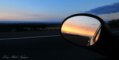 setting sun in rear mirror