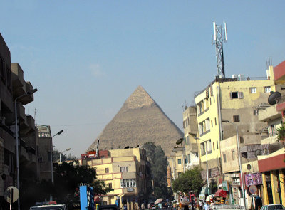 First sighting of Pyramid of Chefren (Khafre) from bus in Cairo suburb