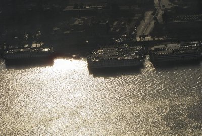 The cruise ships & river w/ more dramatic sunlight