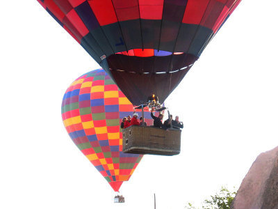 Our pilot is landing the balloon we'll ride.