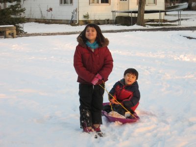 Sarah and Kyle going for a sled ride