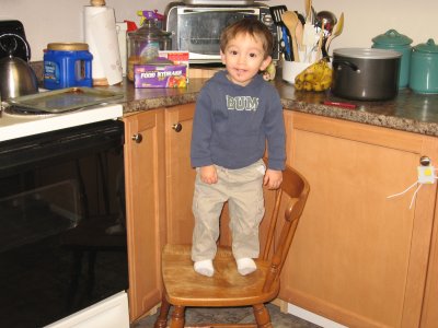 Noah fixing something in the kitchen