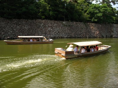 Pair of tourist boats on the castle moat