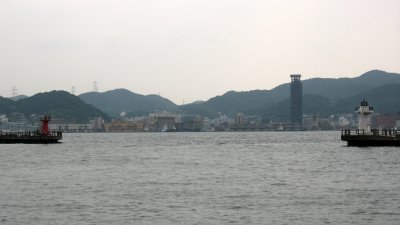 Pair of lighthouses with distant Moji-ko