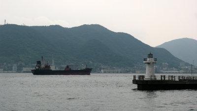 Lighthouse and passing ship