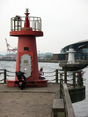 Fishermen out beside the lighthouse