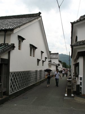 Tourists walking up an old lane in Jōkamachi