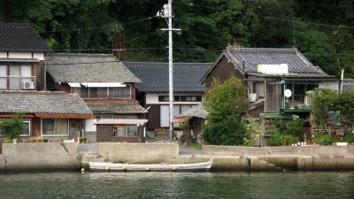 Old Tsurue-no-Watashi boat docked off Tsurue-dai