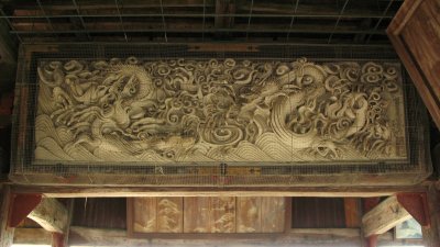 Wooden carving in the old bell tower